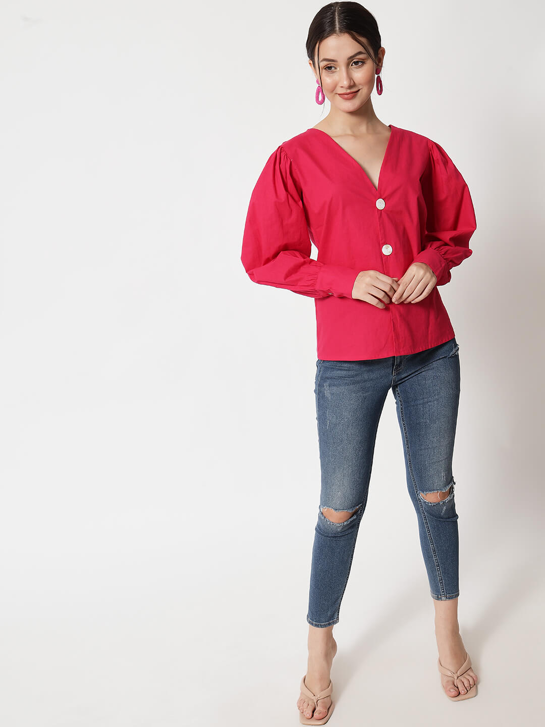 V-neck shirt with statement buttons